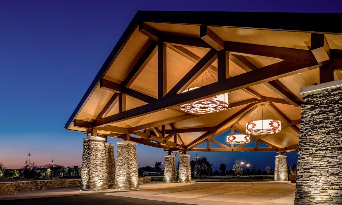 grand entrance exterior and valet area of a modern Craftsman style building