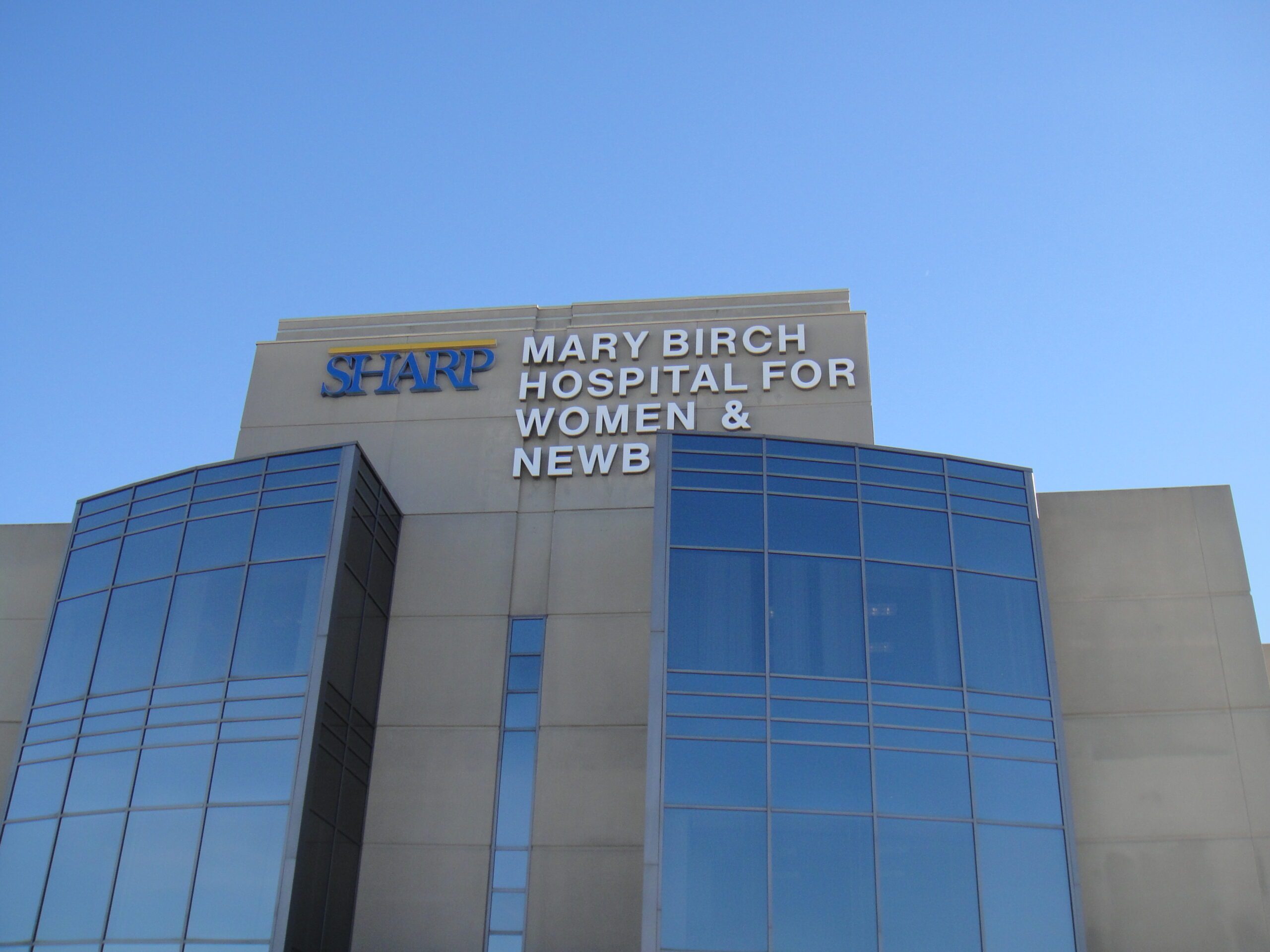 home with tile roof and scaffolding